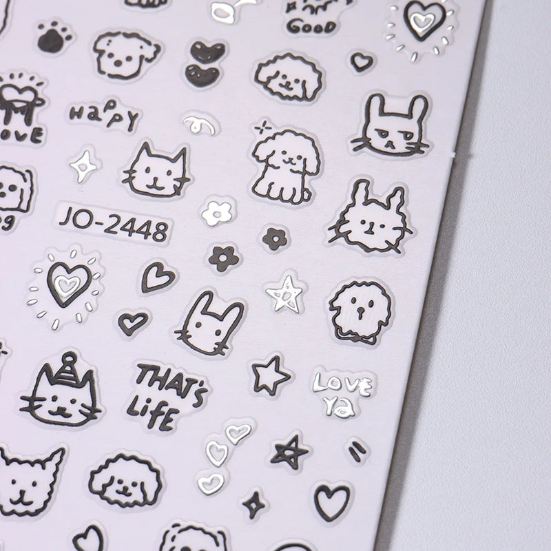 2pcs Cartoon Cat Holographic Nail Stickers – Childlike Heart & Star Designs in Silver Chrome