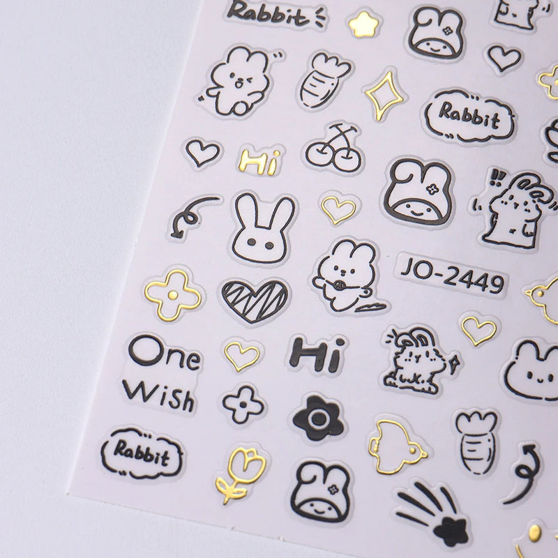 2pcs Cartoon Cat Holographic Nail Stickers – Childlike Heart & Star Designs in Silver Chrome