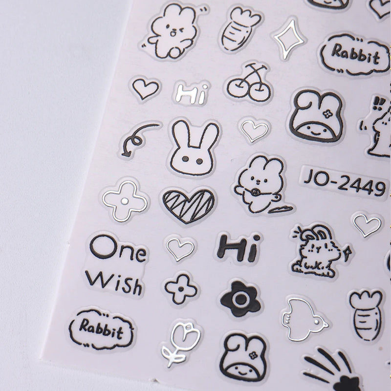 2pcs Cartoon Cat Holographic Nail Stickers – Childlike Heart & Star Designs in Silver Chrome